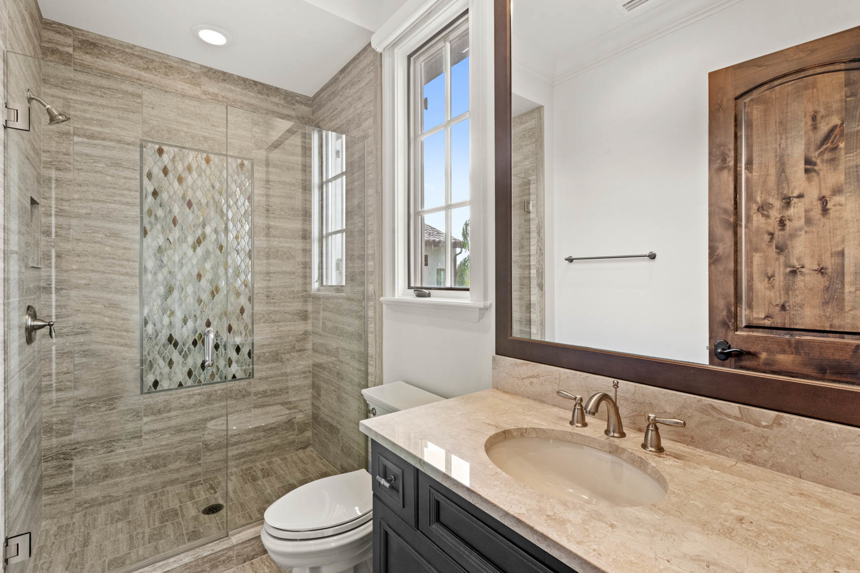 bathroom with sink and walk in shower